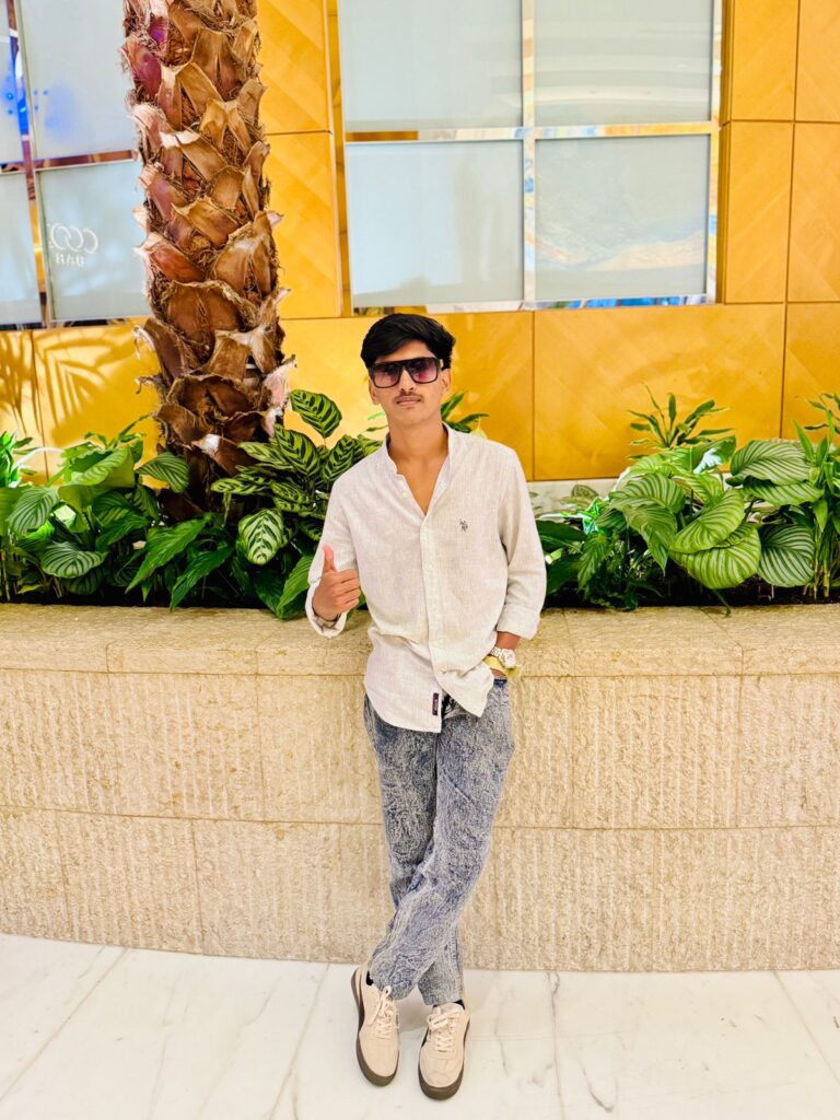 A-boy-standing-in-front-sunglass